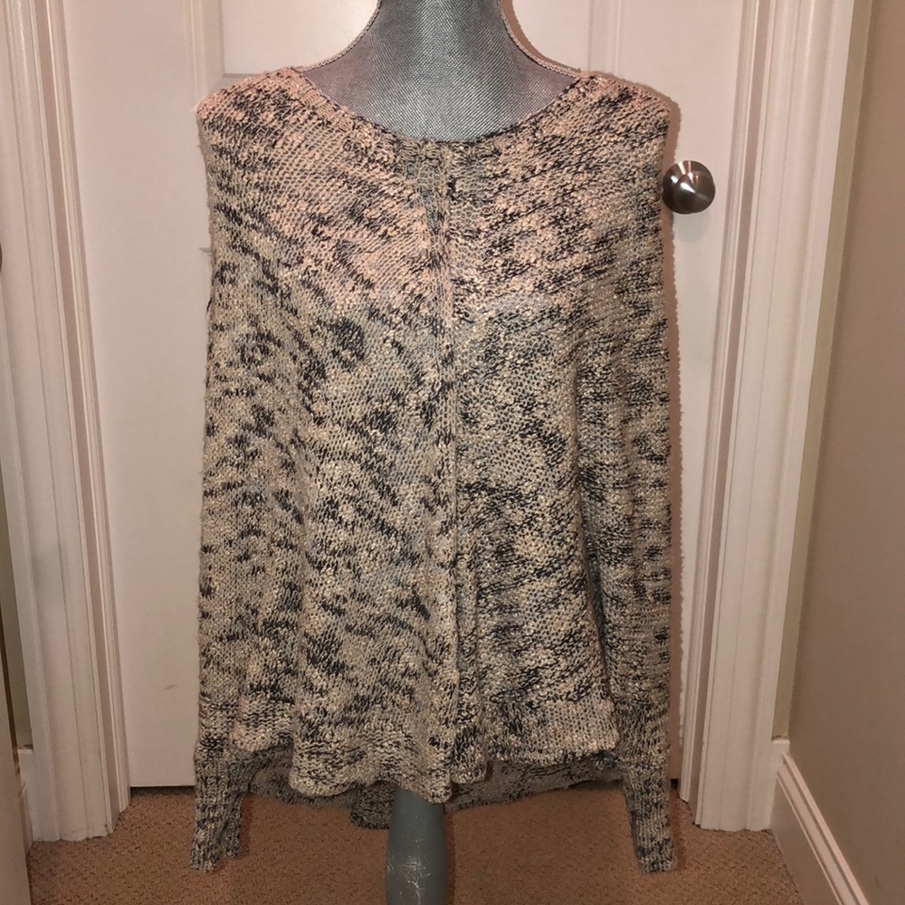 Sweater poncho with sleeves